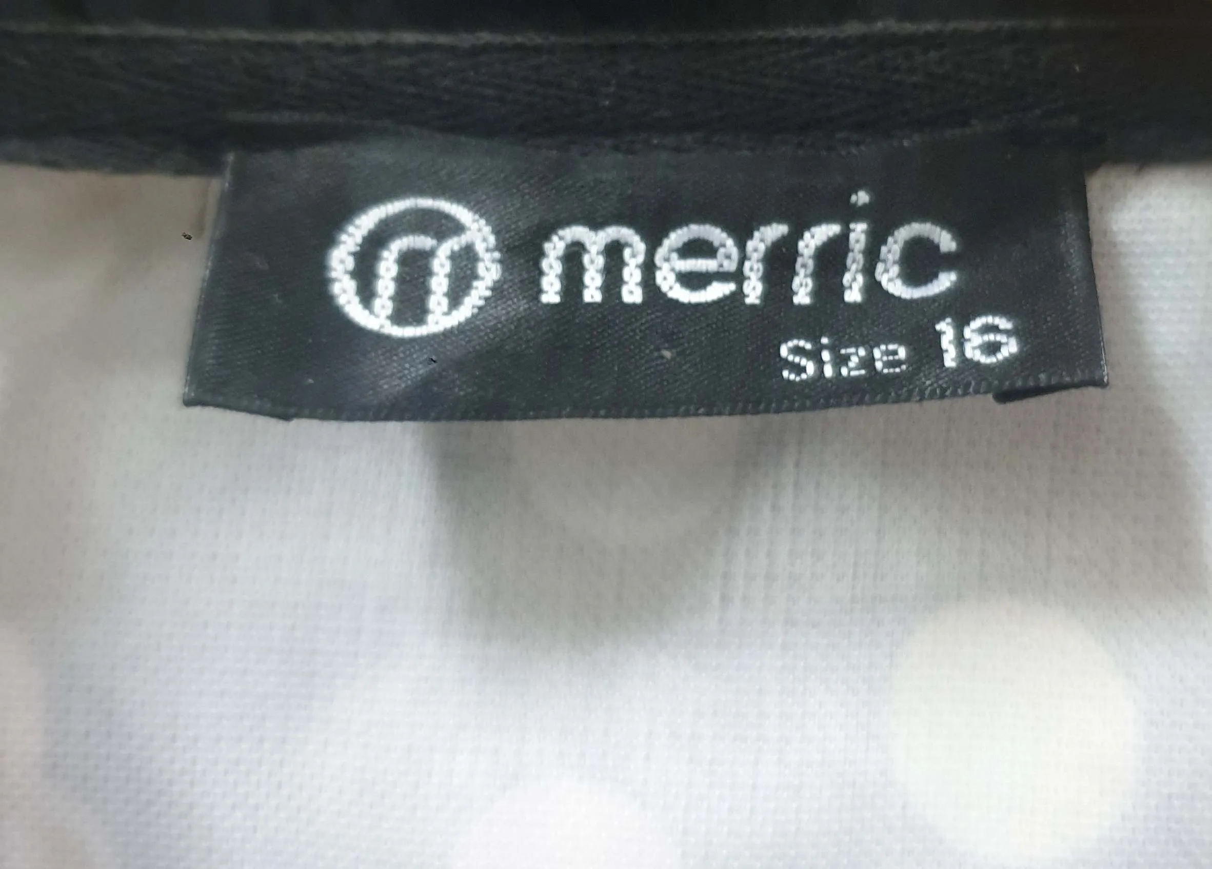 Merric long polka dot raincoat size 16